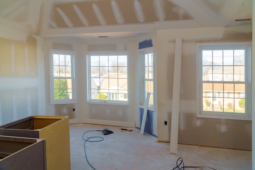 Inside of a residential home being built with new windows installed